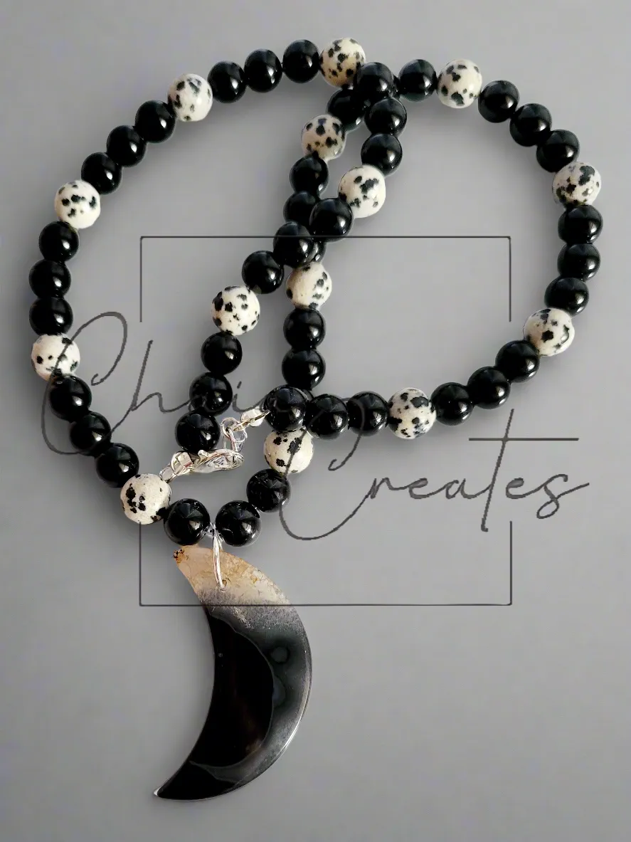 Black & Clear Druzy Agate Moon Pendant on Dalmatian Jasper and Onyx Beaded Necklace