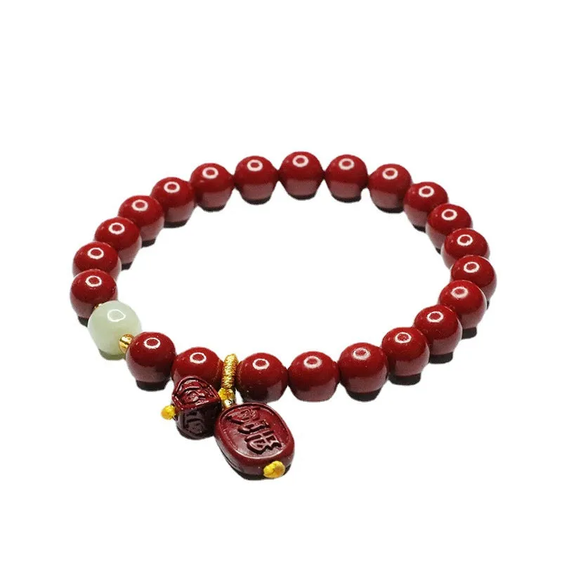 Cinnabar and Jade Sterling Silver Bracelet