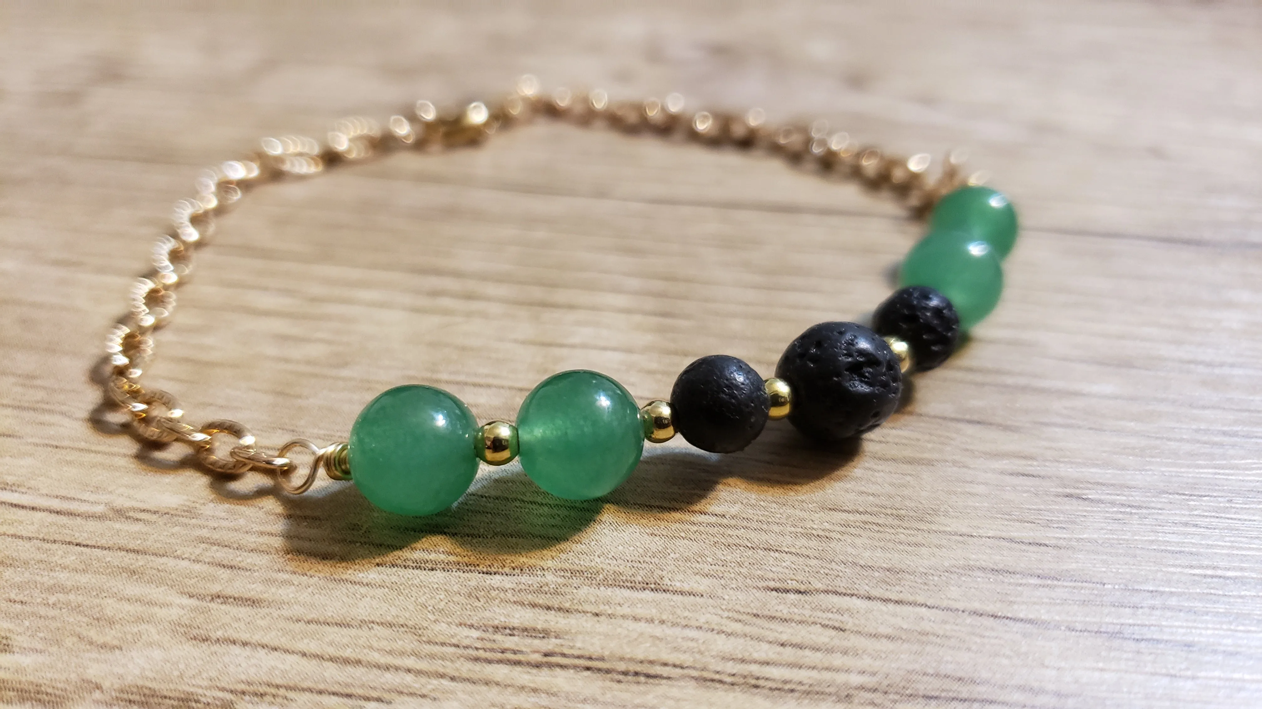 Hand Crafted 8mm Adventurine Rounds & Gold Tone Chain Bracelet with Lava Rocks. Non Tarnish & Fully Adjustable to 8.5" with Lobster Claw Clasp