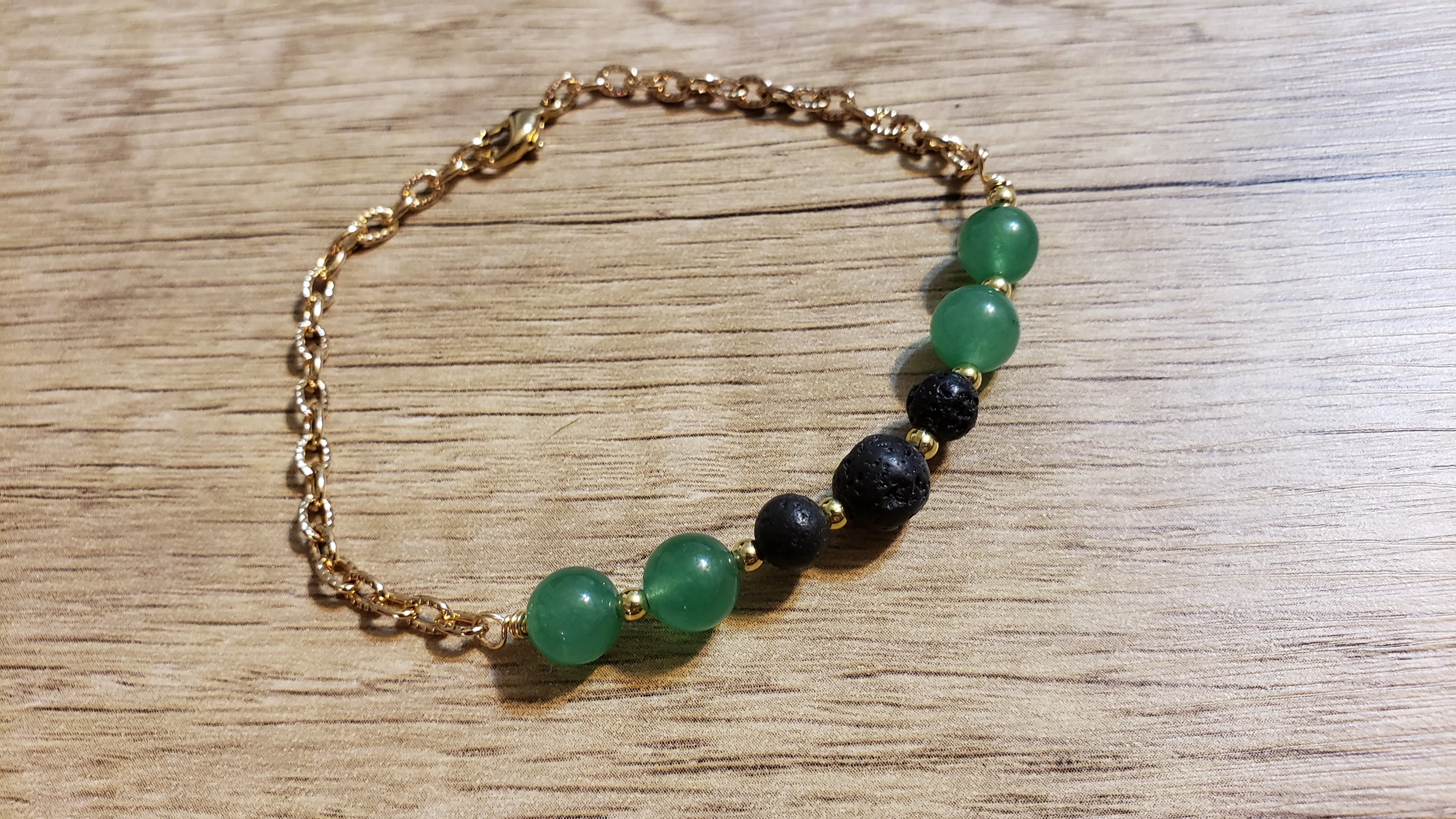 Hand Crafted 8mm Adventurine Rounds & Gold Tone Chain Bracelet with Lava Rocks. Non Tarnish & Fully Adjustable to 8.5" with Lobster Claw Clasp