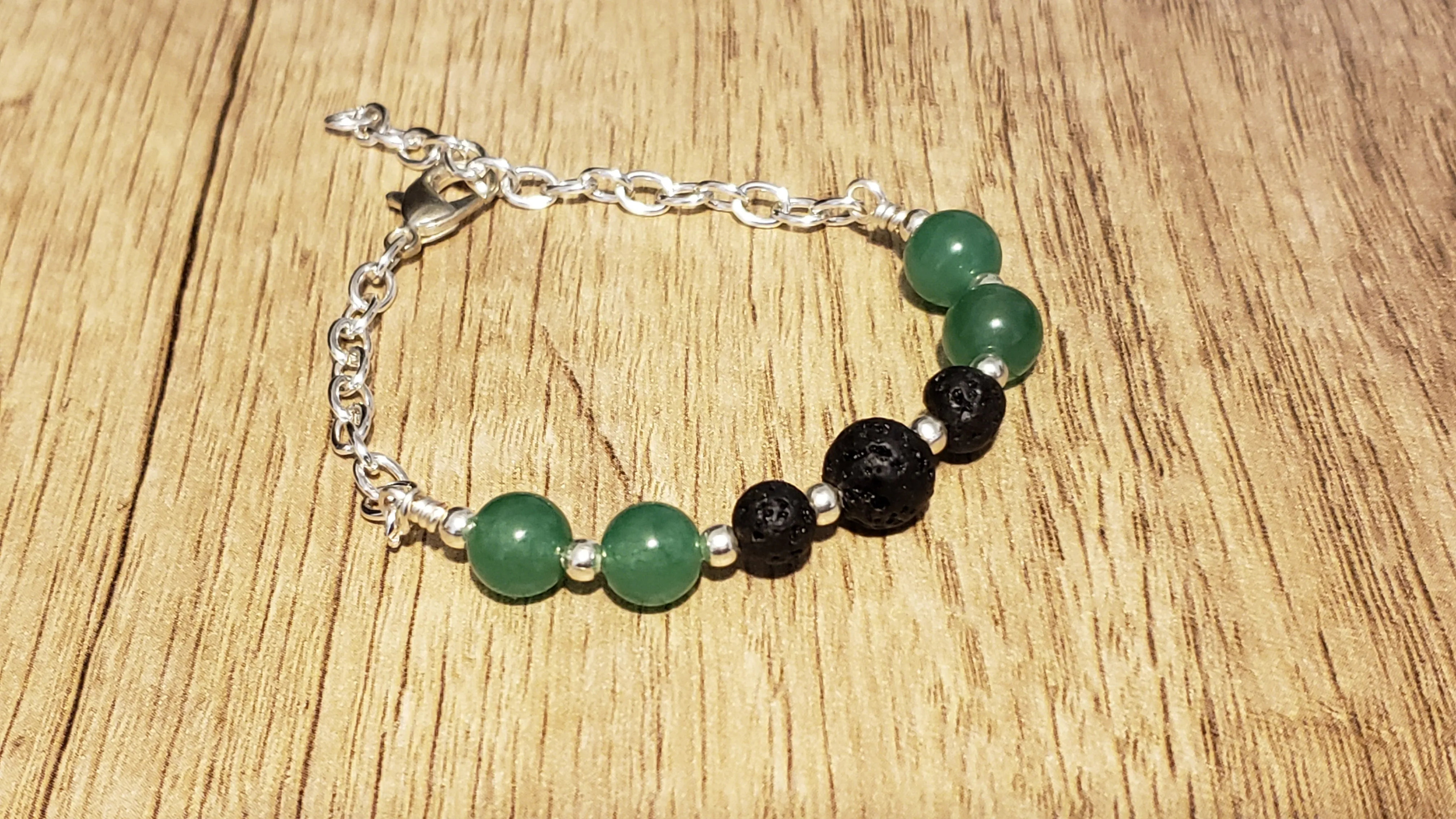 Hand Crafted 8mm Adventurine Rounds & Non Tarnish Chain Bracelet with Lava Rocks. Non Tarnish & Fully Adjustable to 8.5" with Lobster Claw Clasp