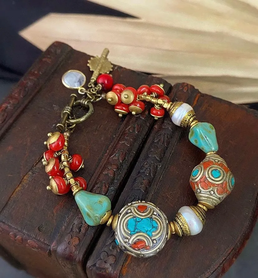 Nepal bliss. Pearl beads, Indonesian glass, nepal beads, czech glass and bronze metal bracelet.