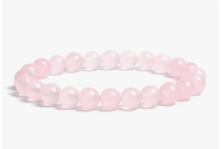 Rose pink quartz stone, stretch cording, yoga, bracelet, jewelry.